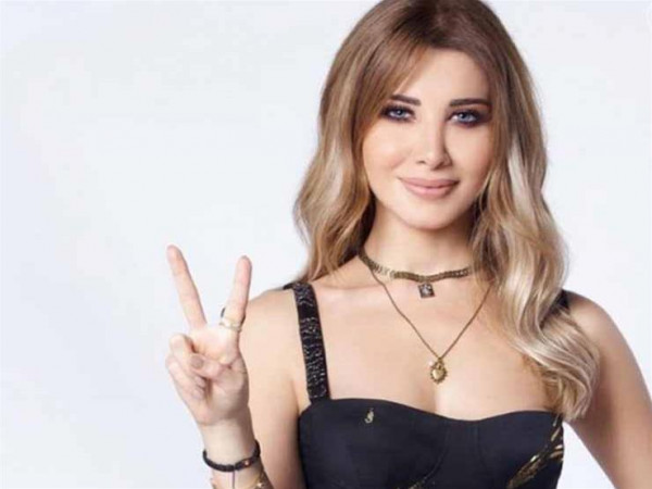 نانسي عجرم جميلة بالأبيض.. شاهدي إطلالتها في تونس